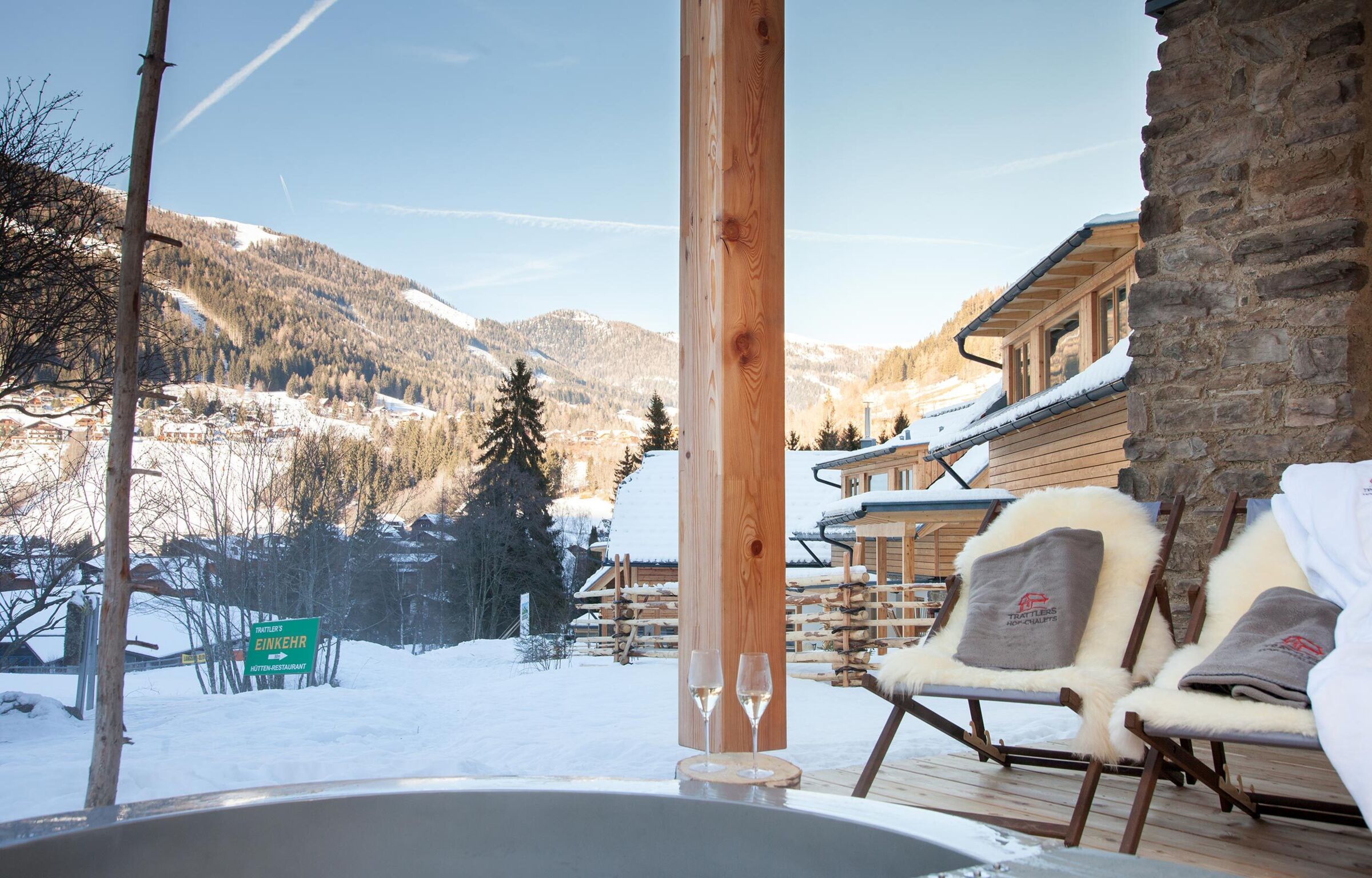 Two deckchairs, snowy landscape and mountains in Bad Kleinkirchheim, Carinthia.